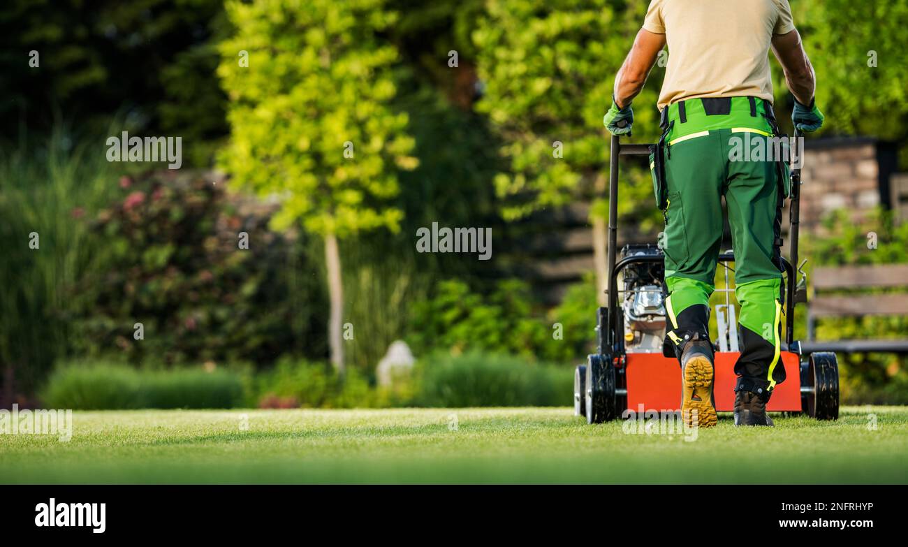 Lawn mowing landscaper gardener hi-res stock photography and 