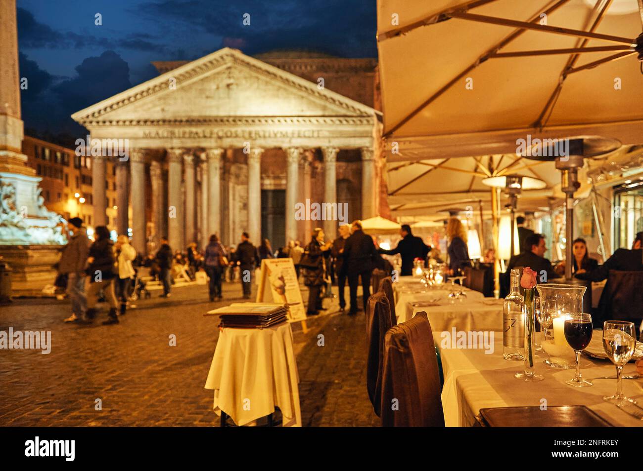 Dinner time in a restaurant at the Pantheon in Rome Italy at sunset Stock Photo