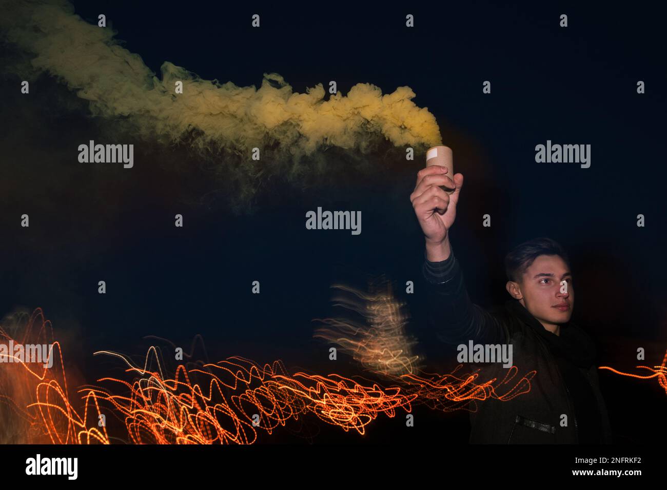 Soccer fan with smoke bomb Stock Photo Alamy