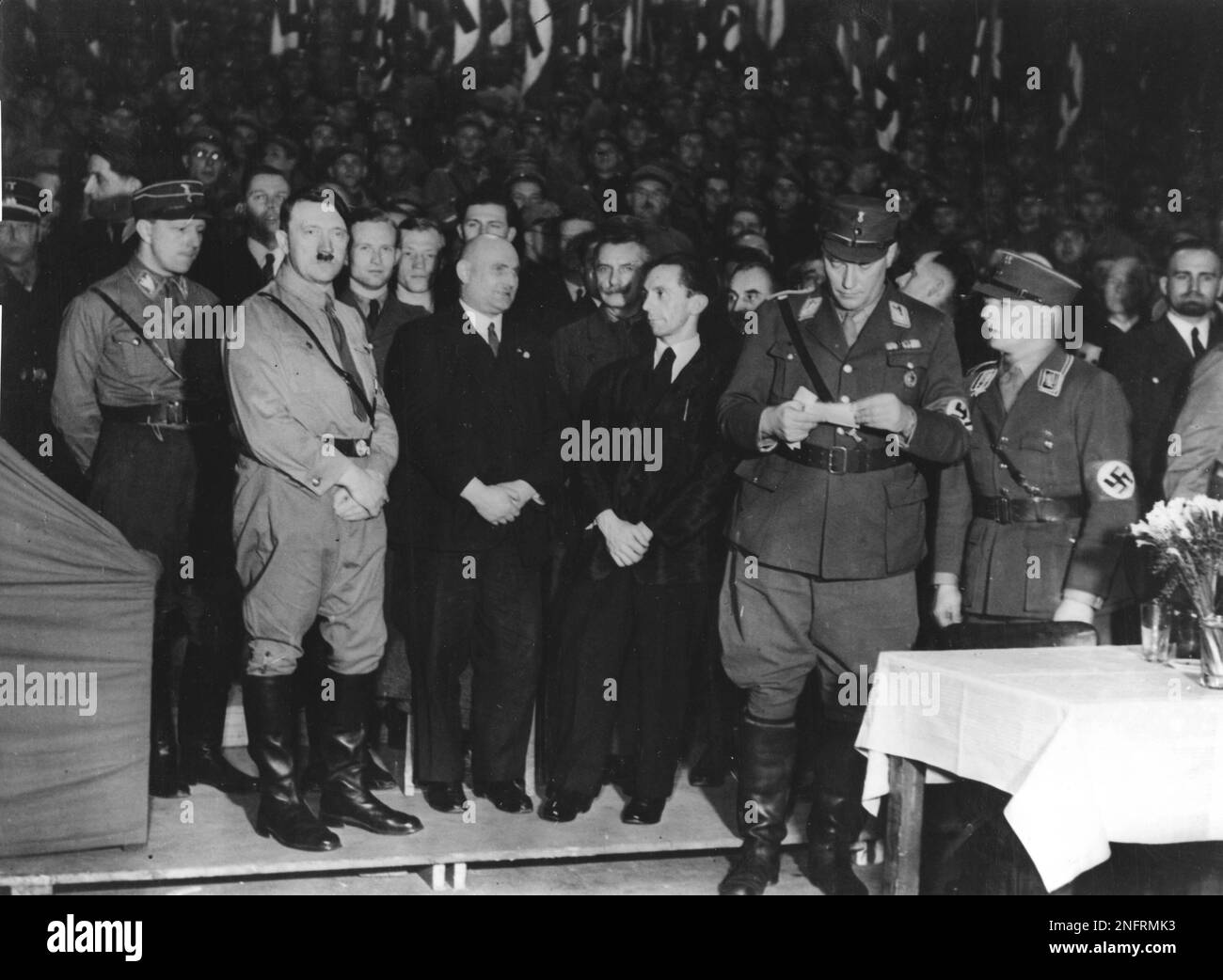 Image shows Graf Helldorf, left, Adolf Hitler, second from left and