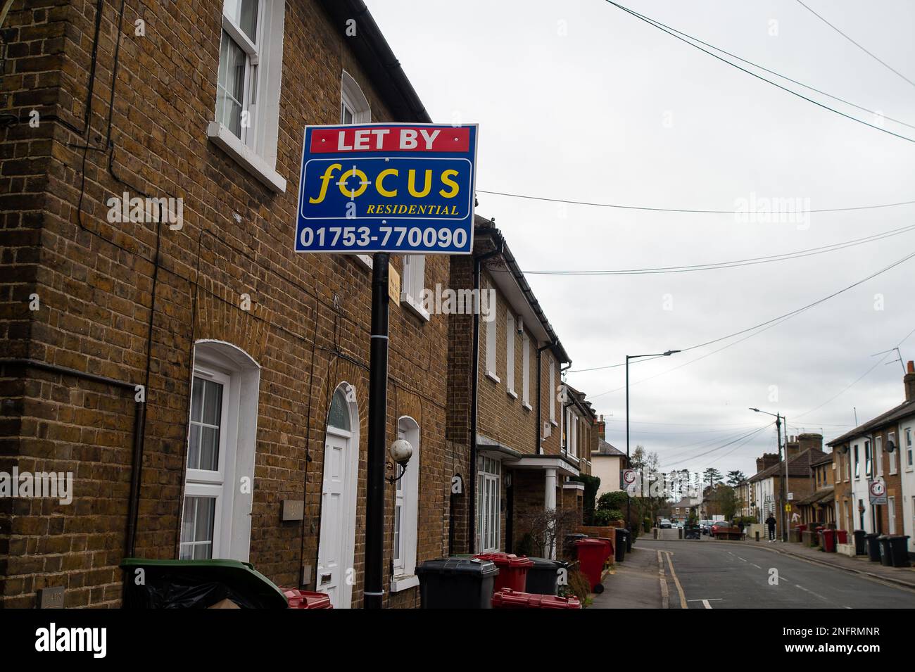 Slough, Berkshire, UK. 17th February, 2023. A Let By Sign outside a terraced house in Slough Town Centre, Berkshire. It has been reported in the press today that UK house prices could fall by as much as 40%. The number of buyers is begining to dry up as people are concerned about buying homes if the prices are to fall, whereas meanwhile, those selling properties don't want to reduce the price. Experts are predicting house prices could take a massive fall as they did in the 1990s when many people found themselves in a negative equity situation. Credit: Maureen McLean/Alamy Live News Stock Photo