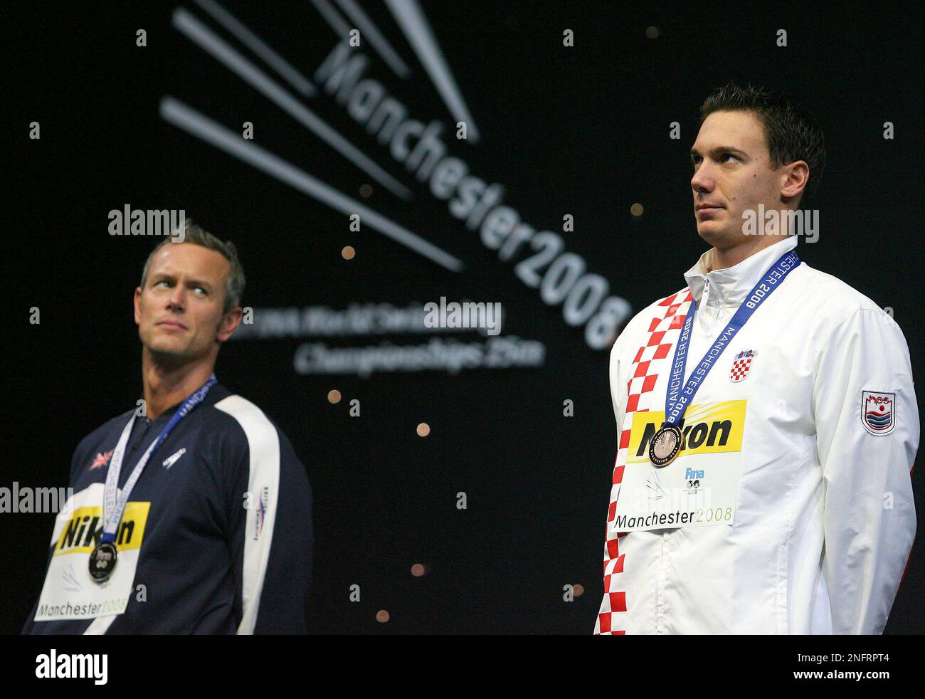 Croatia's Duje Draganja, right, the gold medalist, and Britain's