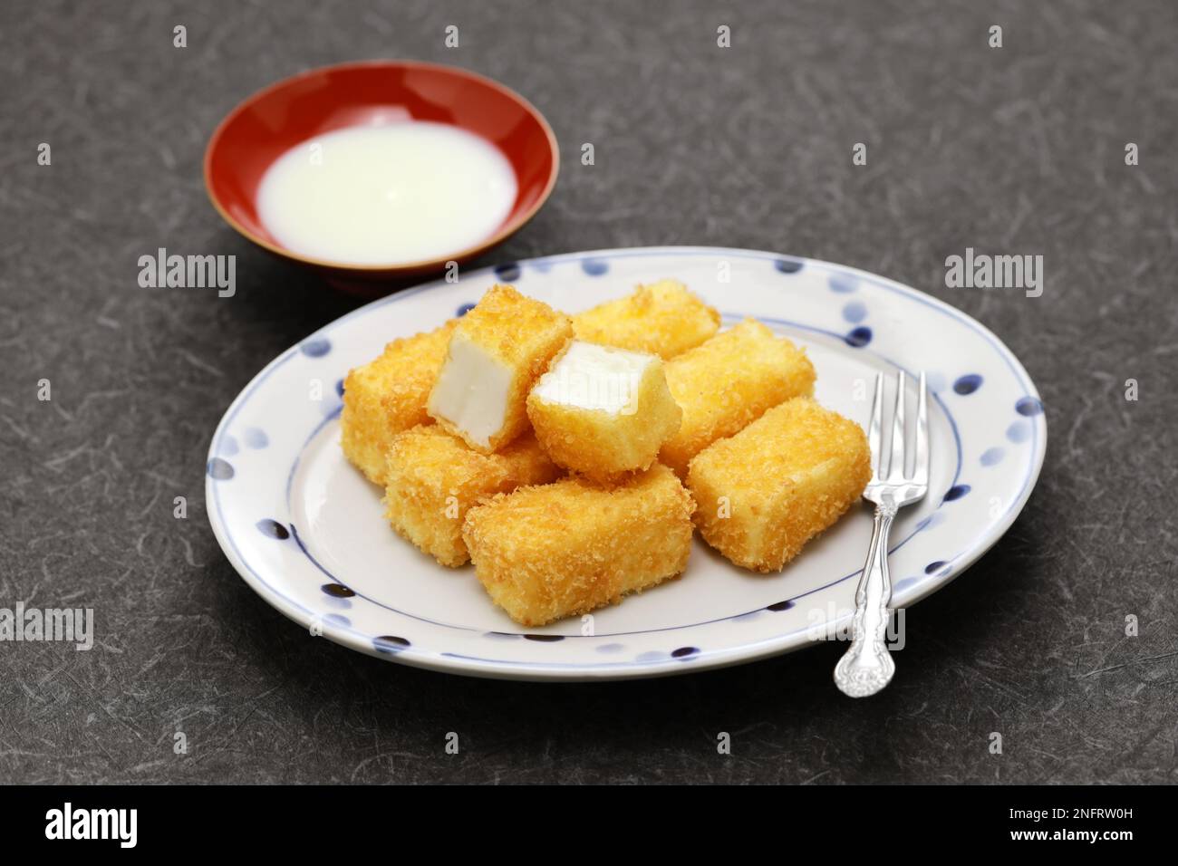 crispy fried milk with condensed milk, Chinese dessert Stock Photo Alamy