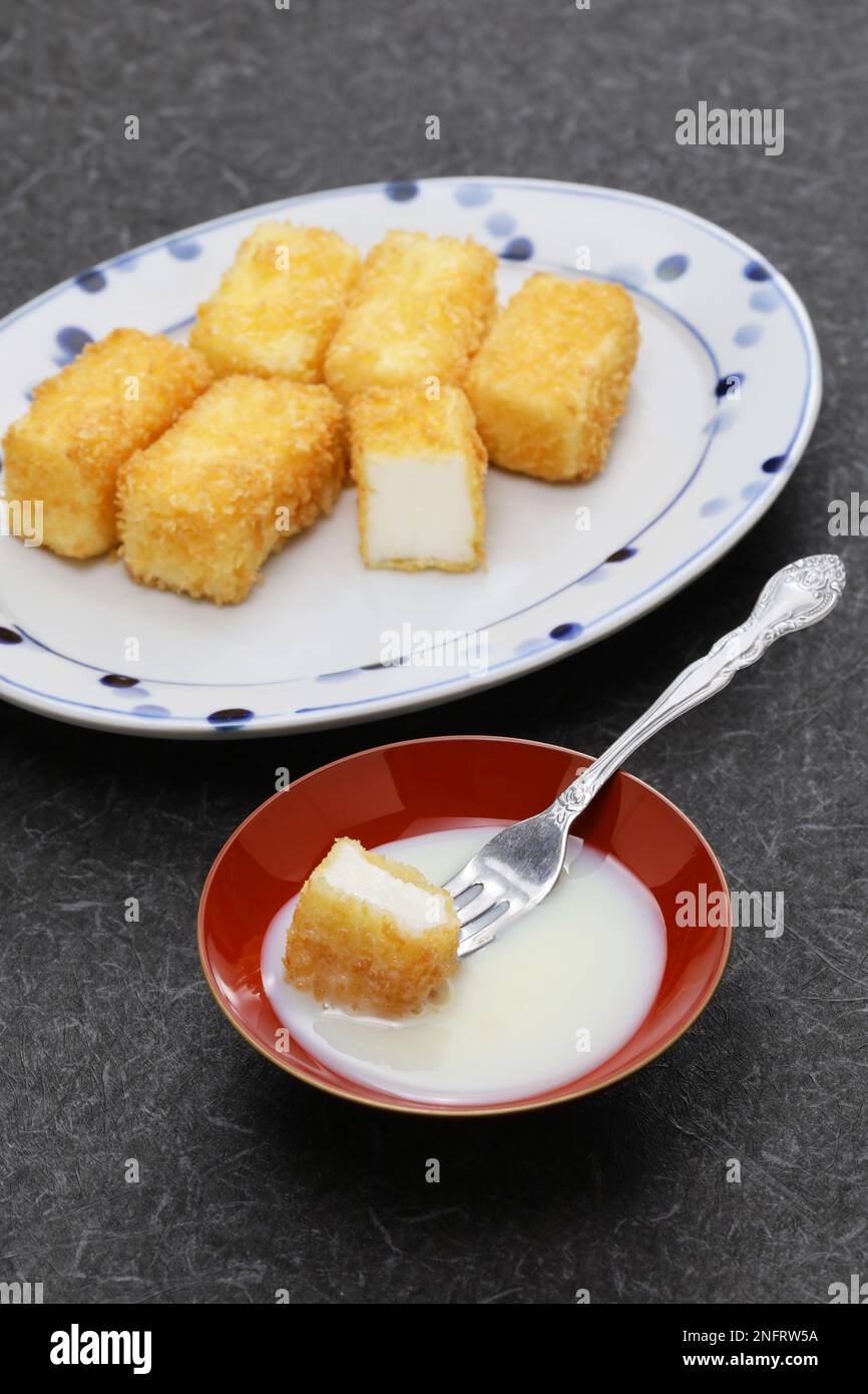 crispy fried milk with condensed milk, Chinese dessert Stock Photo Alamy