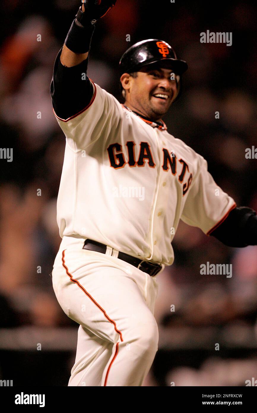 San Francisco Giants' Benji Molina celebrates after hitting a walk off home  run off San Diego Padres reliever Cla Meredith in the 11th inning of a  baseball game in San Francisco, Tuesday,, image size:866x1390
