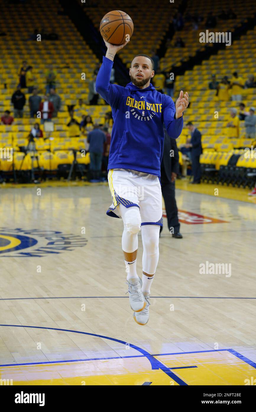 Warriors Stephen Curry 30 during warm ups as the Golden State Warriors prepare to ake on the Houston Rockets in game 6 of the NBA Western Conference finals at Oracle Arena in
