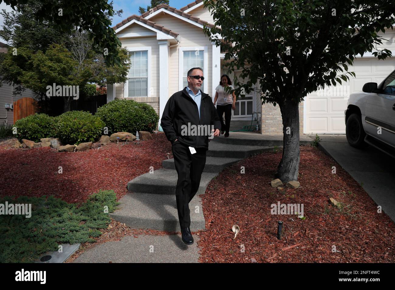 Two people from the Solano County public defenders office are seen leaving  after a visit to the home of Ina Rogers on Tues. May 15, 2018 in Fairfield,  Ca. Ina Rogers, 30