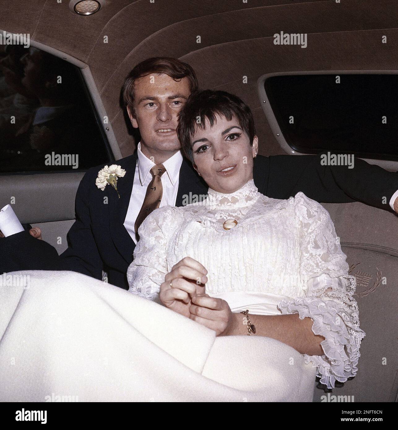 Australian entertainer Peter Allen, and his bride, Liza Minnelli, pose