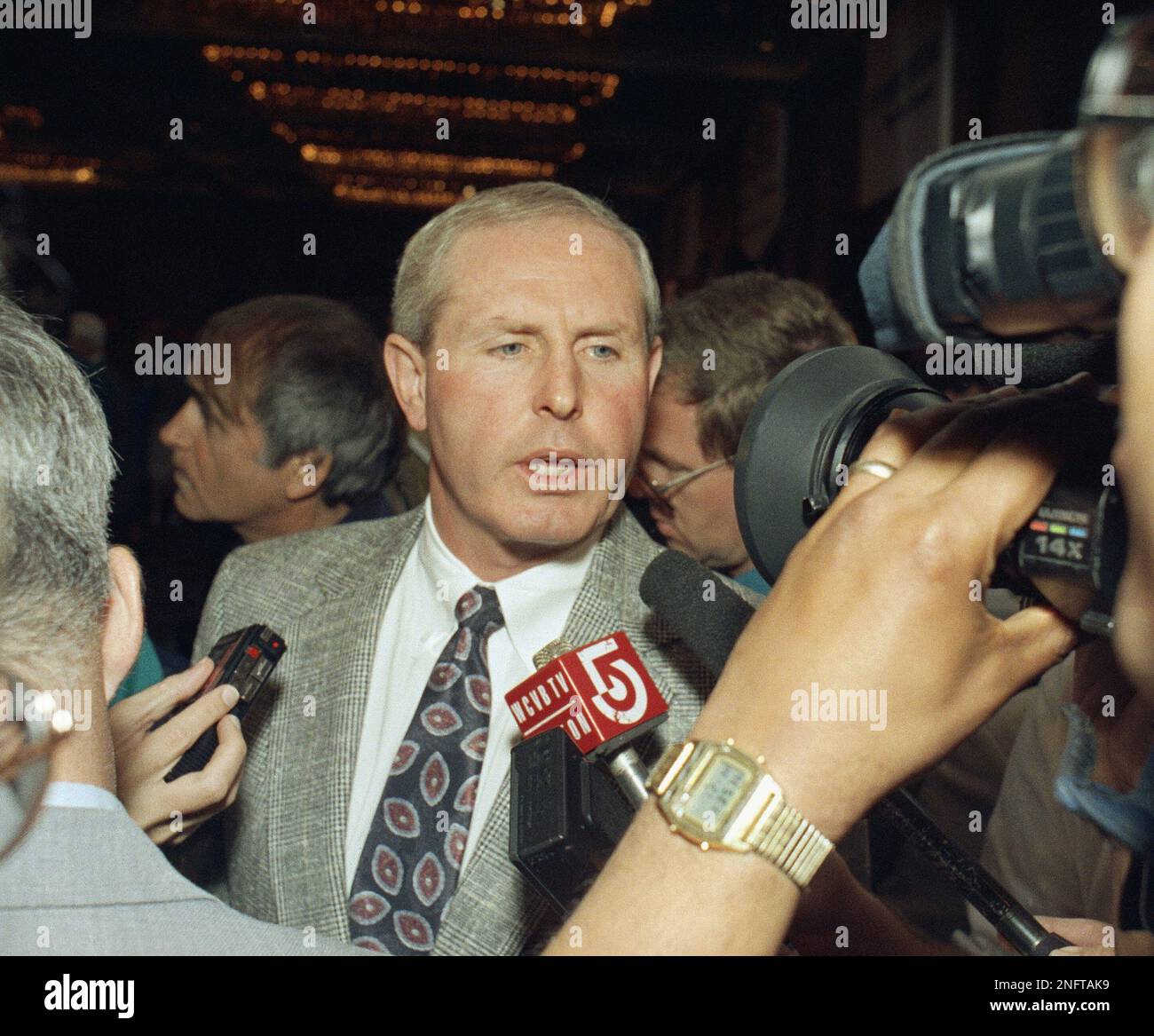 Boston College football coach Tom Coughlin. Speaks to reporters before hall of fame bowl on Dec