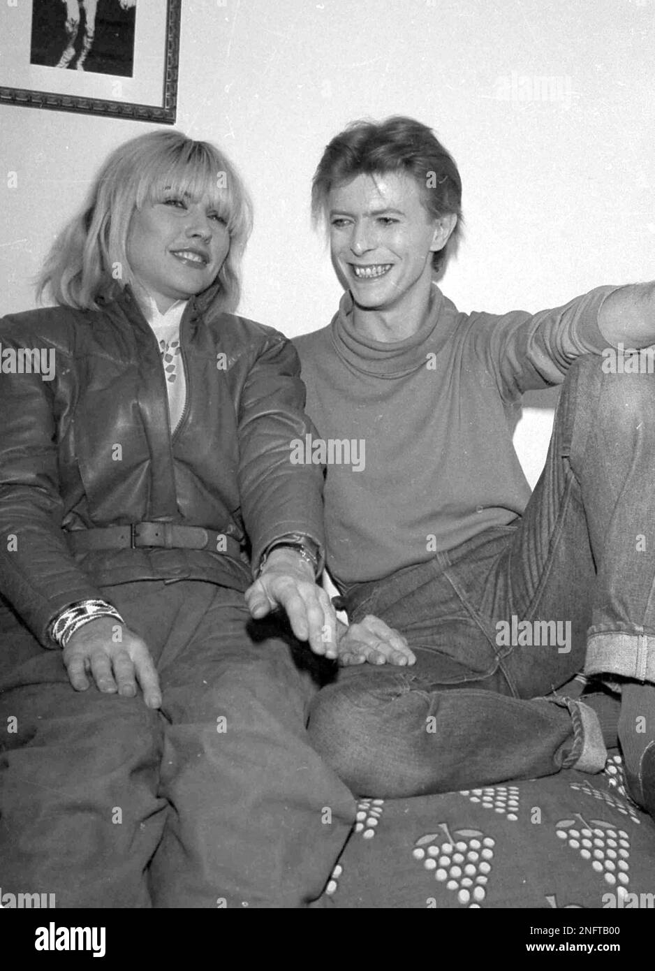 Deborah Harry of the rock band Blondie visits David Bowie backstage at ...