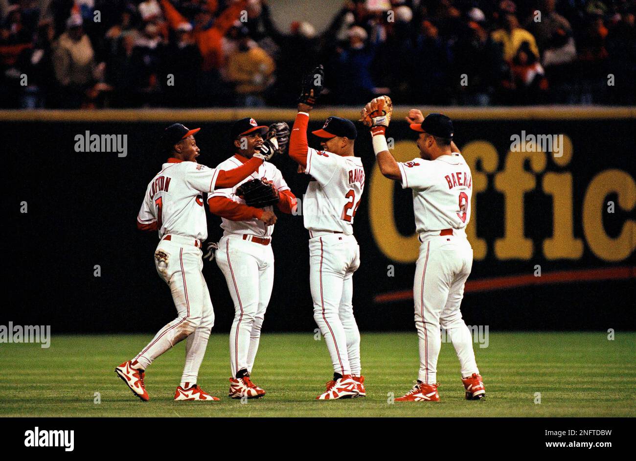 Cleveland Indians from left, Kenny Lofton, Wayne Kriby, Manny Rarirez and Carlos  Baerga celebrate their 3-2 ALCS victory over the Seattle Mariners on  Sunday, October 15, 1995 in Cleveland. The Indians hold