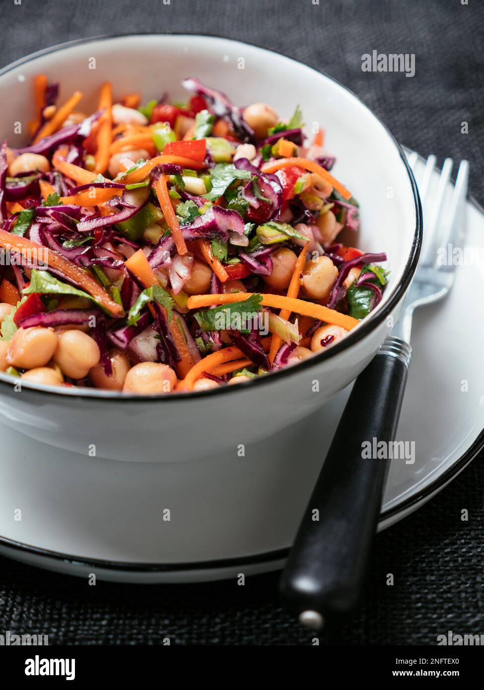 Home made chickpea slaw salad with bell peppers Stock Photo