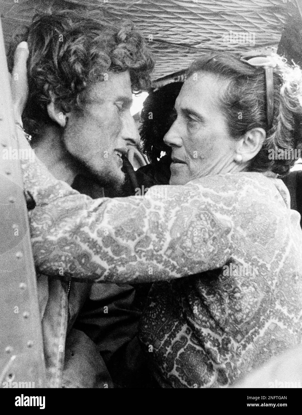 Roy Harley, one of the survivors of the Uruguayan plane that crashed into  the Andes in Chile, is embraced by his mother moments after his rescue in  the mountains, Dec. 23, 1972. (