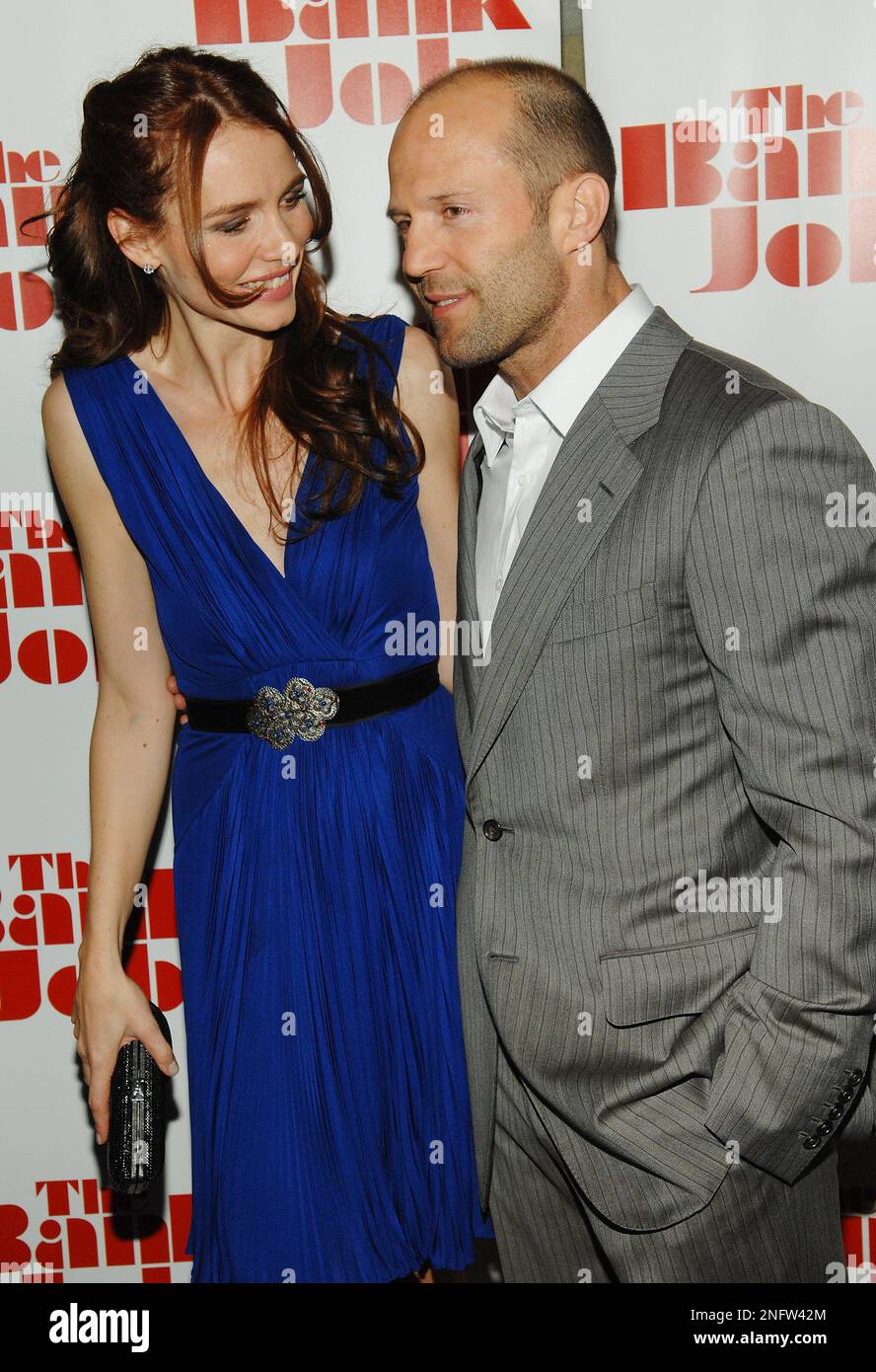 Actors Saffron Burrows and Jason Statham attend a Cinema Society screening of "The Bank Job" at