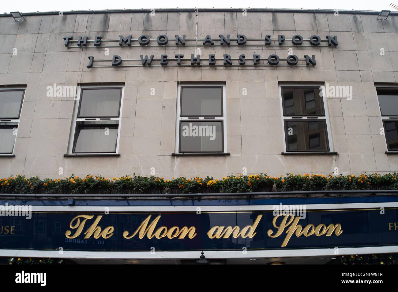 Slough, Berkshire, UK. 17th February, 2023. The Wetherspoon Moon and Spoon pub in Slough, Berkshire. As the cost of living crisis continues, it has been reported that some J D Wetherspoon pubs are selling a pint of beer for just under £7.00. Wetherspoons have also increased their meal deal prices by up to 75p and some drinks by 25p. Credit: Maureen McLean/Alamy Live News Stock Photo