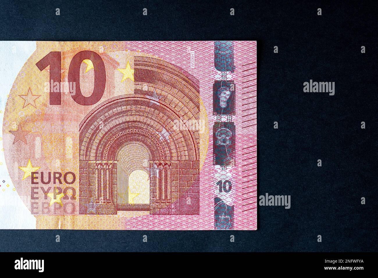 10 euro close up on black background for business finance subjects. World money concept, inflation and economy concept. Currency close up in detail. Stock Photo