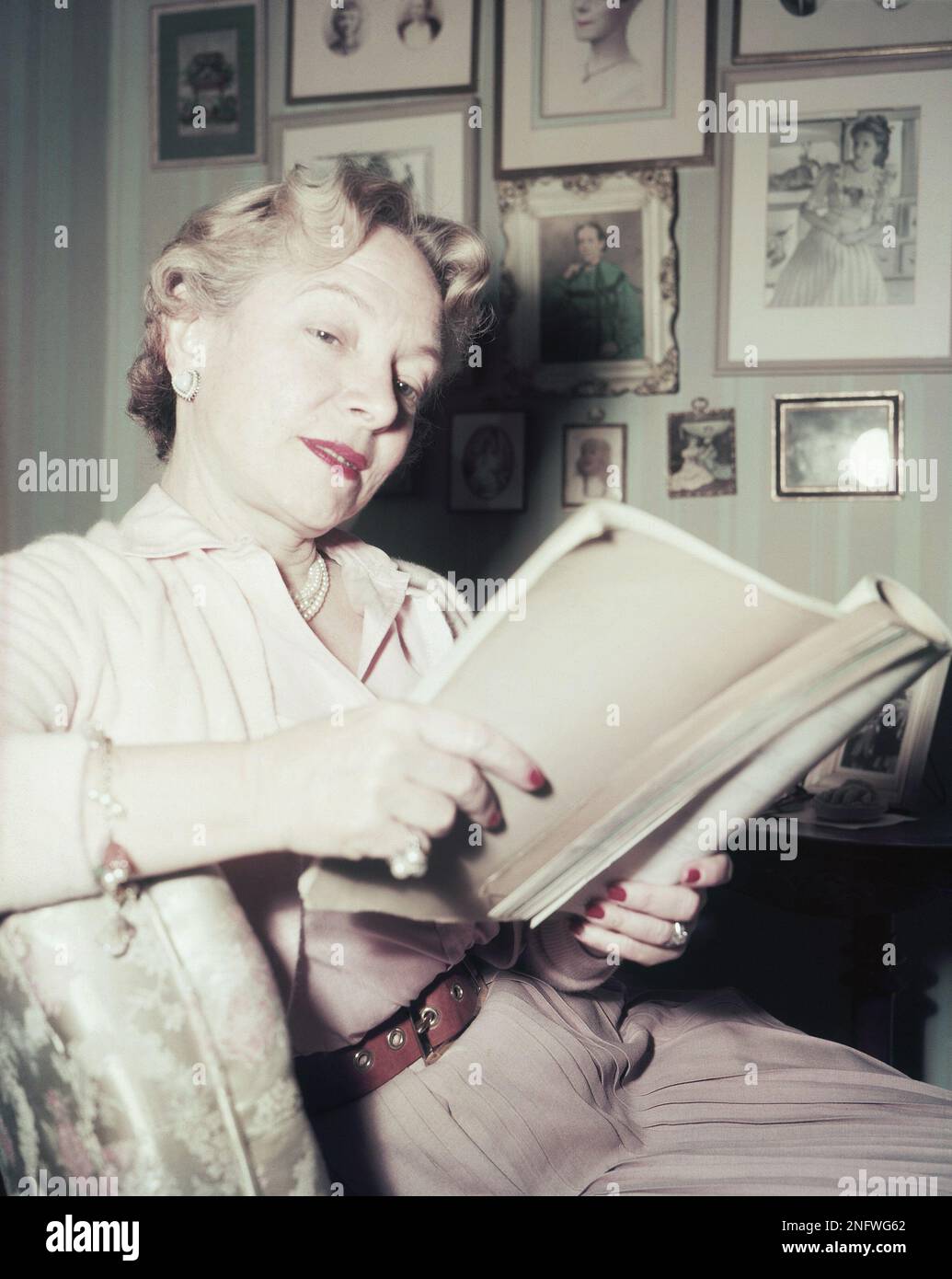 Actress Helen Hayes reads a script at her home at Nyack, New York in