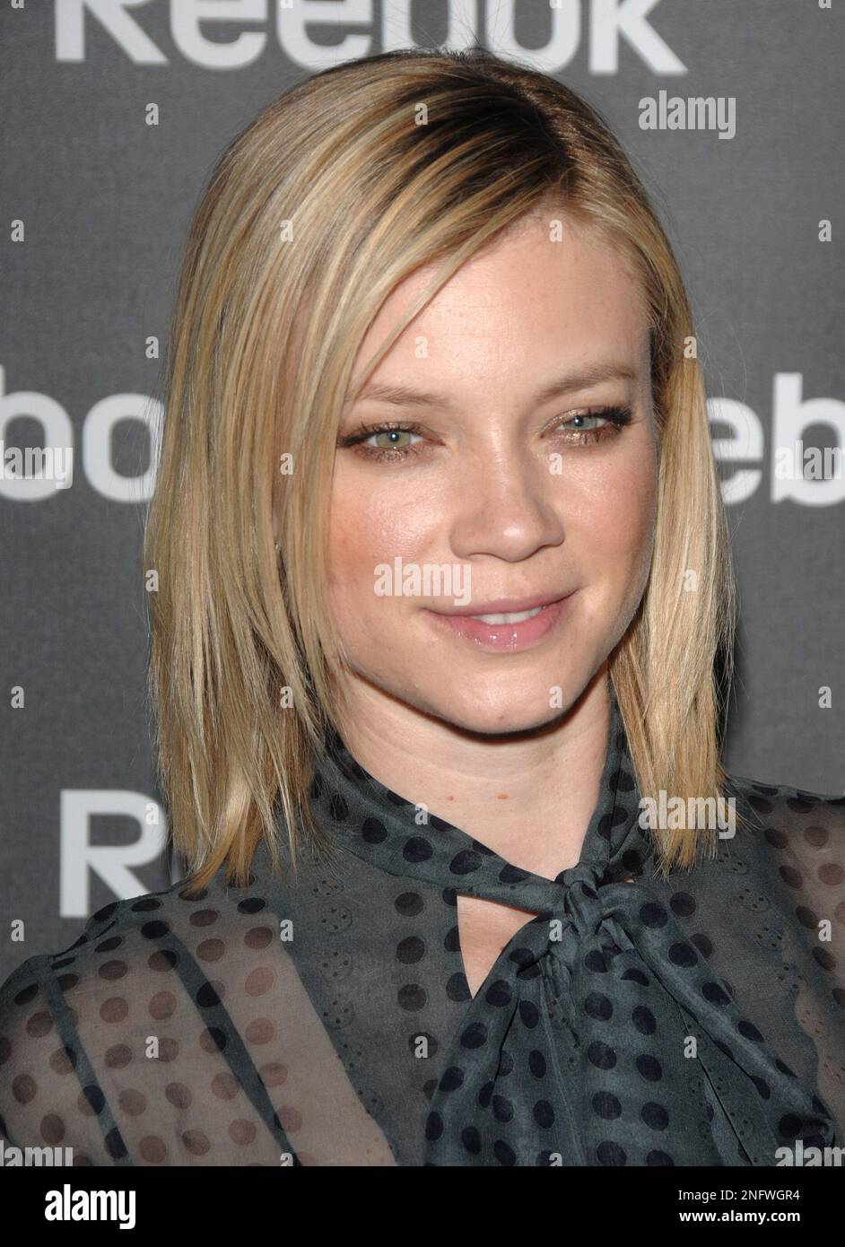 Actress Amy Smart arrives at the Reebok party, unveiling it's