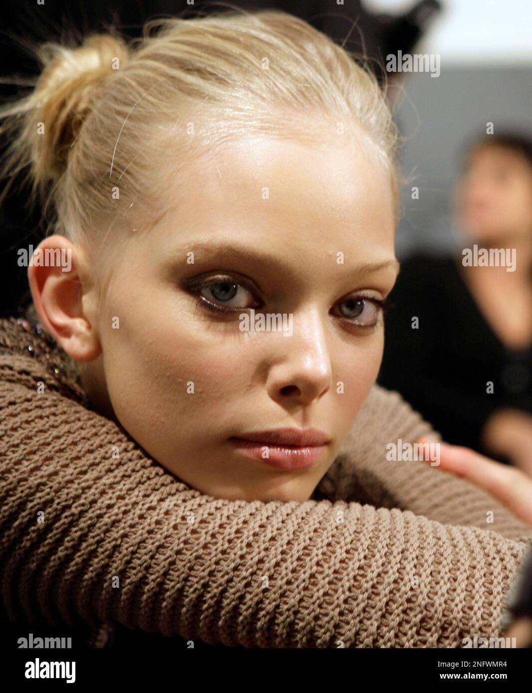Top model Tanya Dziahileva, from Belarus, gets makeup applied prior to the Just Cavalli Fall/Winter 2008/2009 collection presented in Milan, Italy, Sunday, Feb. 17, 2008. (AP Photo/Alberto Pellaschiar) Stock Photo