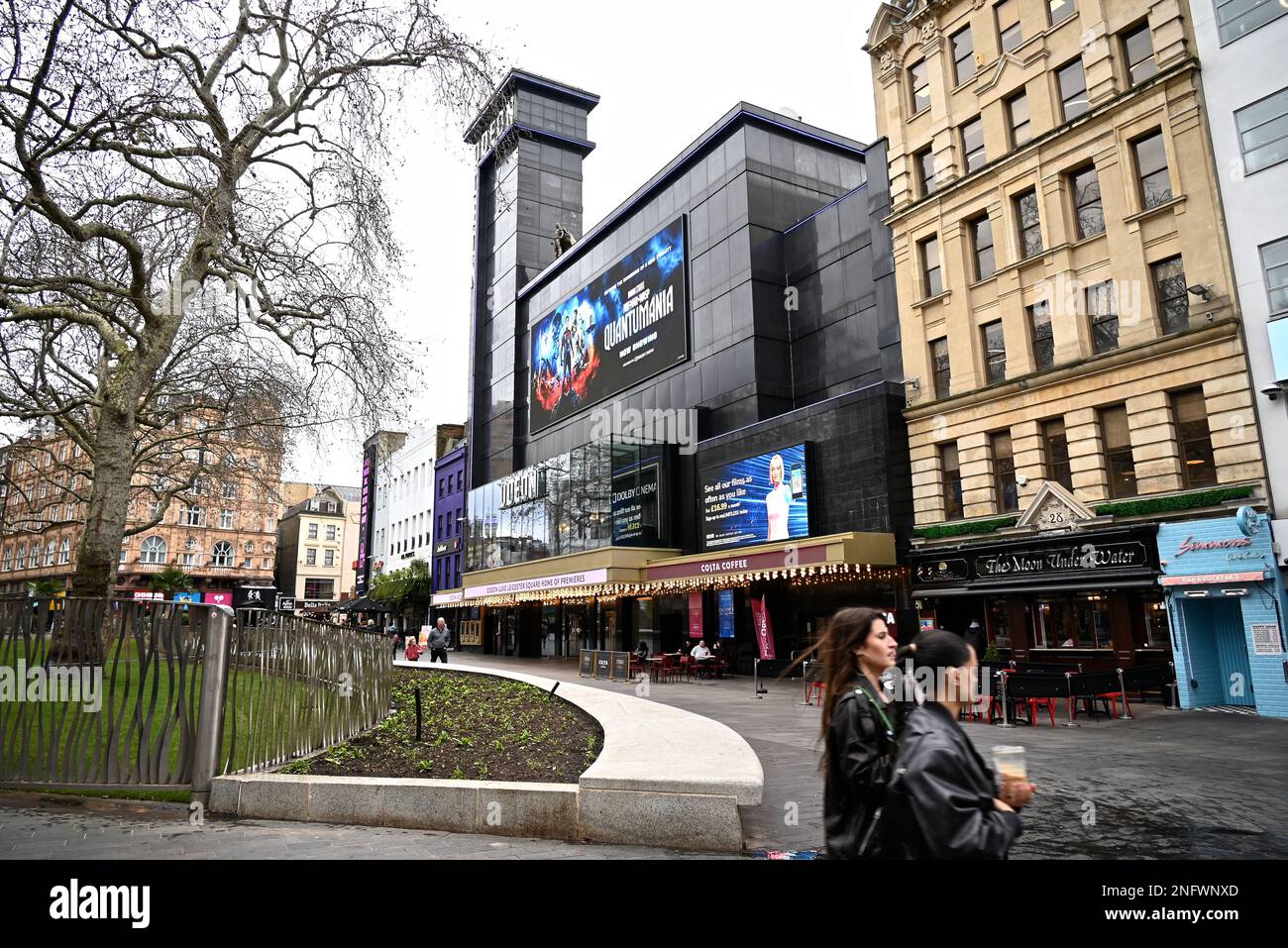 Leicester Square is a pedestrianised square in the West End of London, England. It was laid out in 1670 as Leicester Fields, which was named after the recently built Leicester House, itself named after Robert Sidney, 2nd Earl of Leicester .Unveiling icons from a century of cinema with an interactive statue trail, get ready for Scenes in the Square in London’s home of film and entertainment. Stock Photo