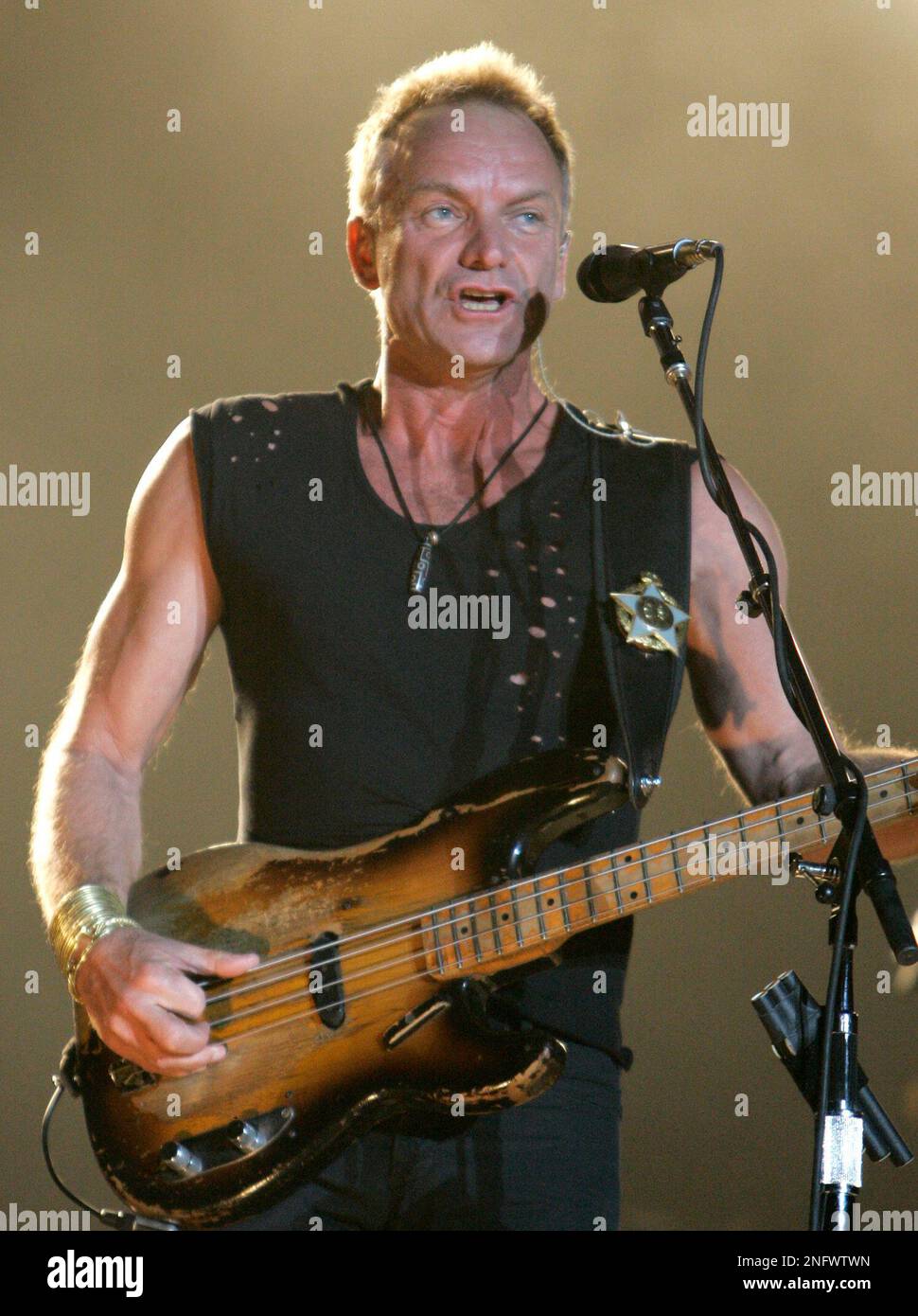 Lead vocalist and bassist Sting of The Police performs during a concert ...