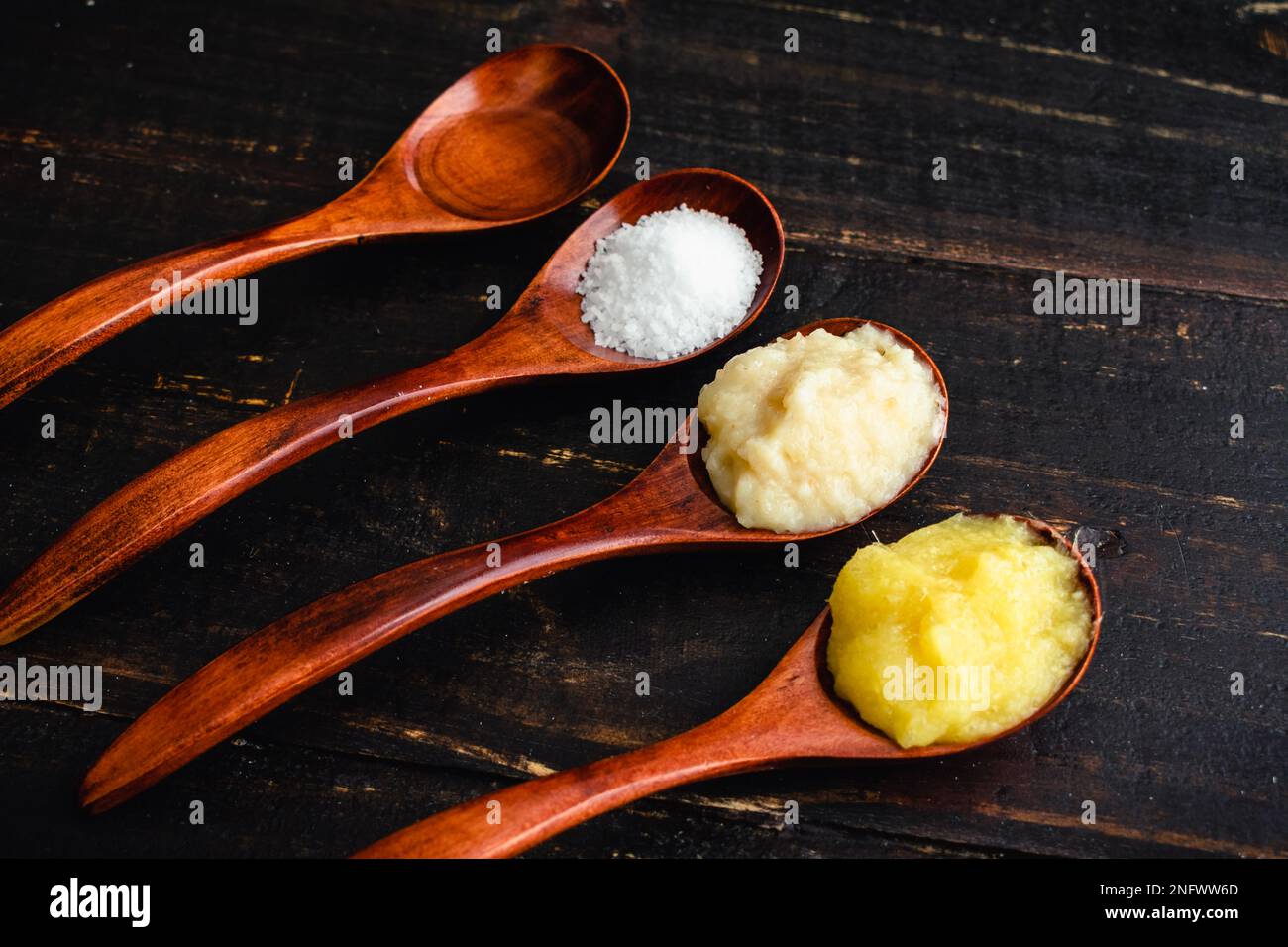 GingerGarlic Sauce Ingredients in Wooden Spoons Pureed ginger and