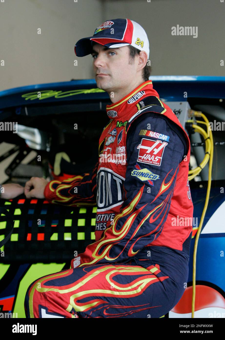 NASCAR driver Jeff Gordon gets ready to get in his car during practice for the Daytona 500 auto