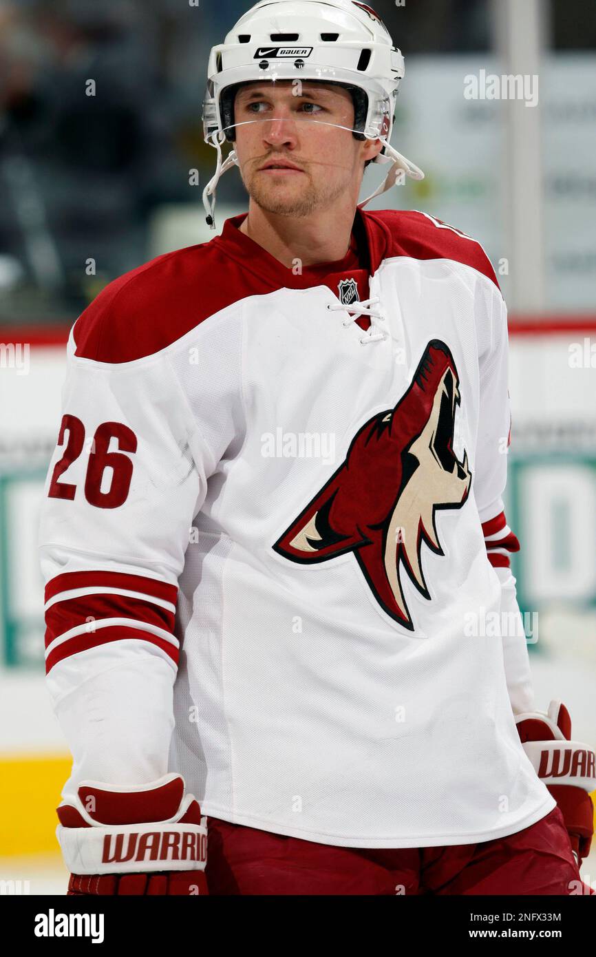 Phoenix Coyotes center Joel Perrault (26) is congratulated by