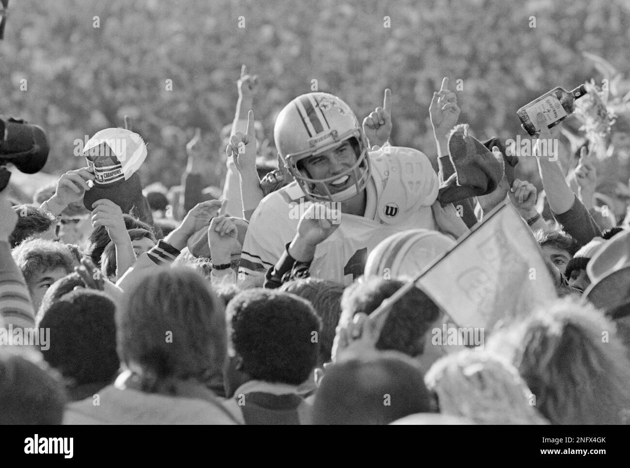 Ohio State University quarterback Art Schlichter got a victory ride by  teammates and fans on Saturday, Nov 19, 1979 in Ann Arbor after 18-15 win  over Michigan. The Buckeyes came from behind
