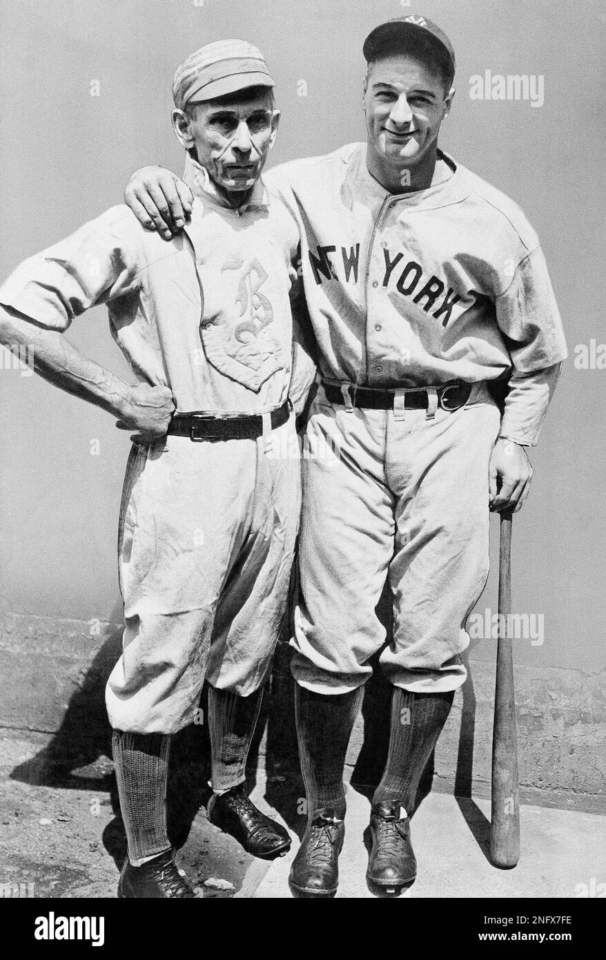Old time baseballer Bobby Lowe,left, with Lou Gehrig Yankee first baseman  poses soon after Gehrig hit four home runs in one game on June 1932 in  Detroit. Lowe was the first major