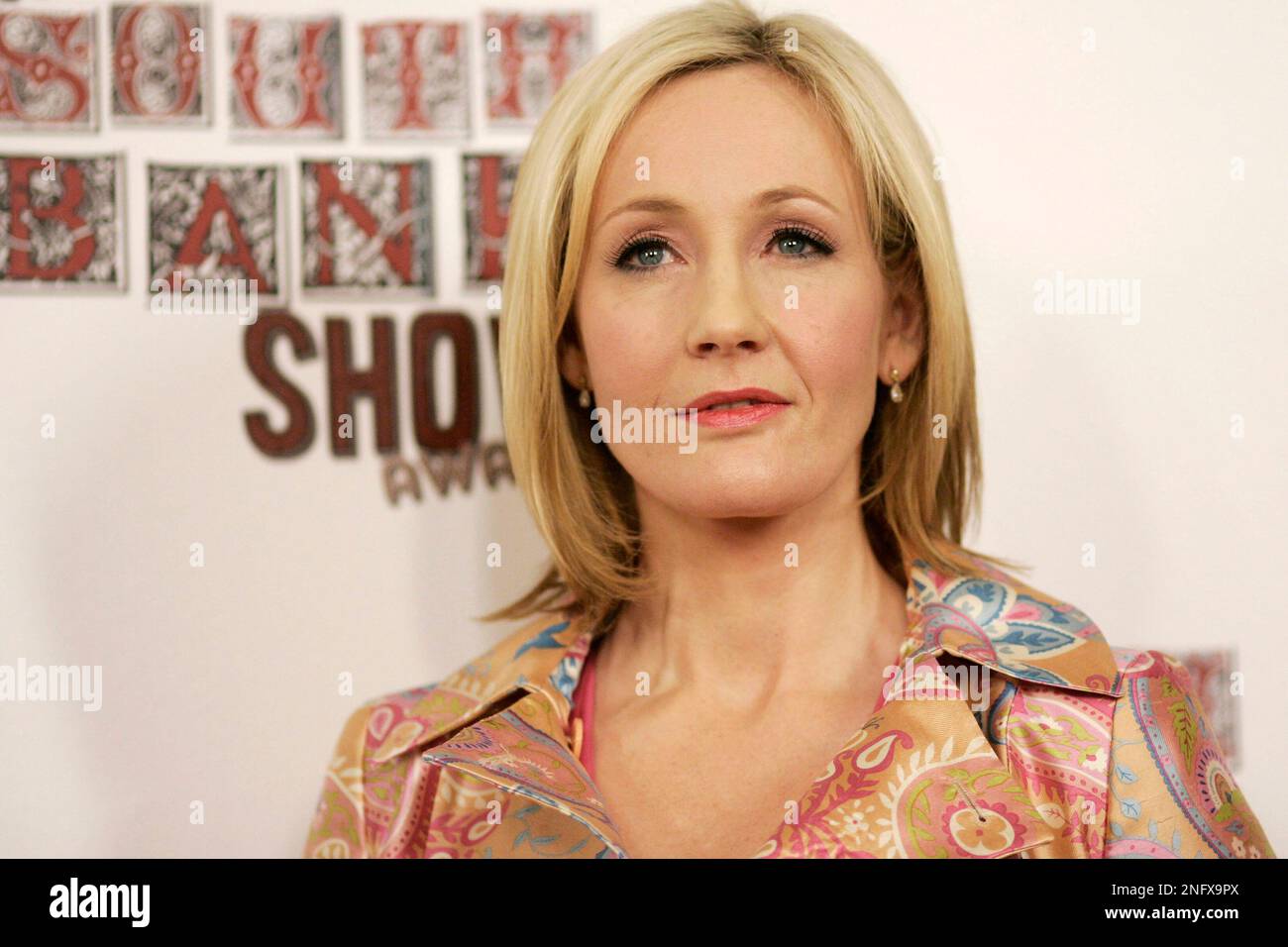 British author J K Rowling poses, winner of Outstanding Achievement ...