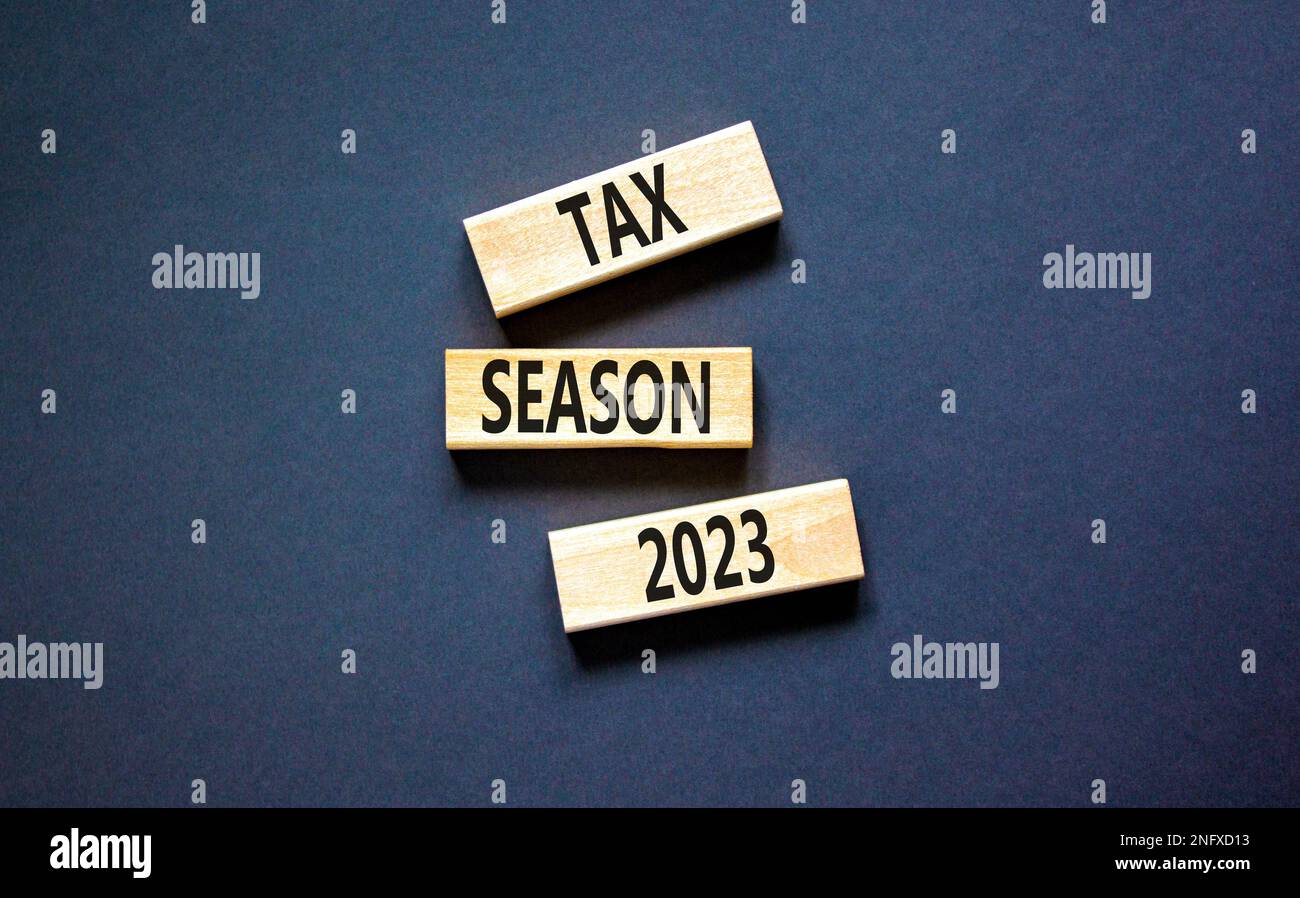 Tax season 2023 symbol. Concept words Tax season 2023 on wooden blocks