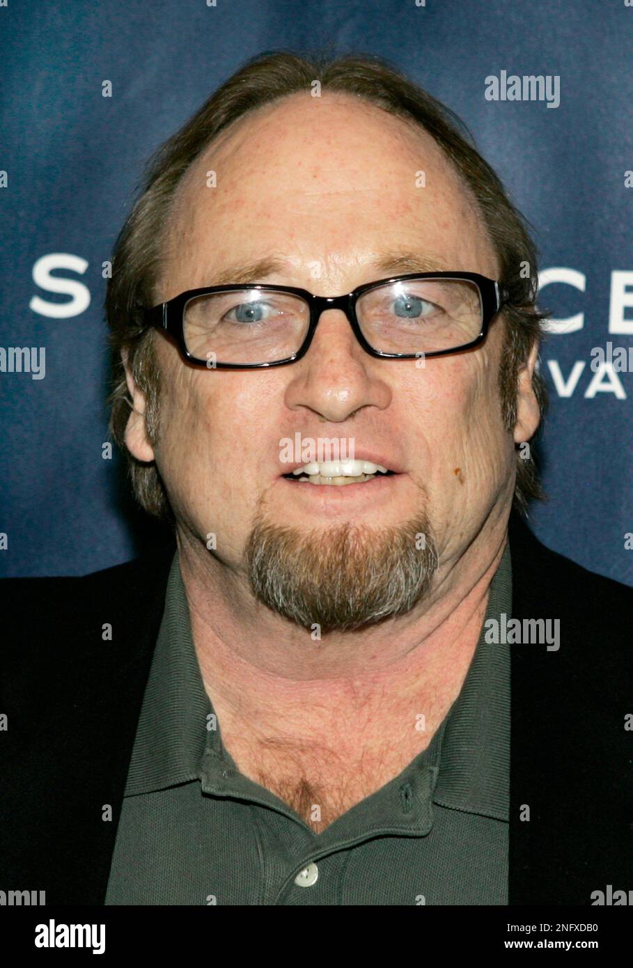 Stephen Stills of Crosby, Stills, Nash and Young, appears on the red