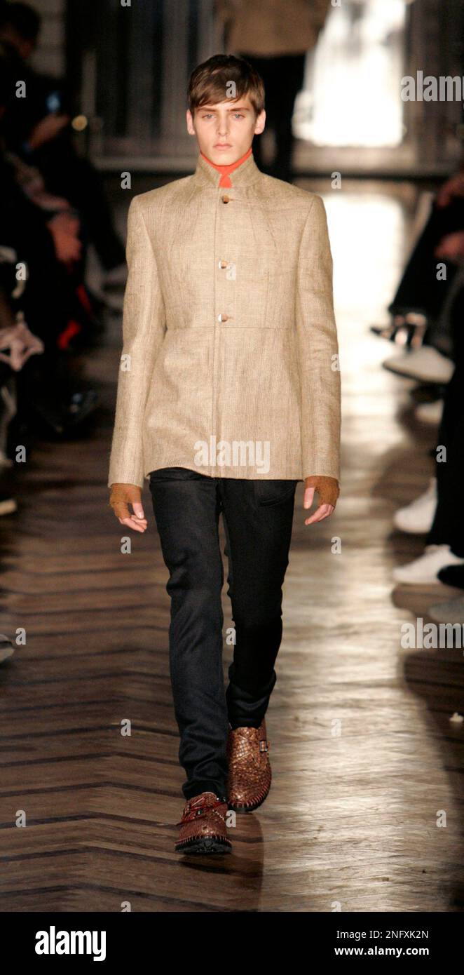 A model wears a creation by Belgium's fashion designer Raf Simons A model wears a creation by Belgium's fashion designer Raf Simons