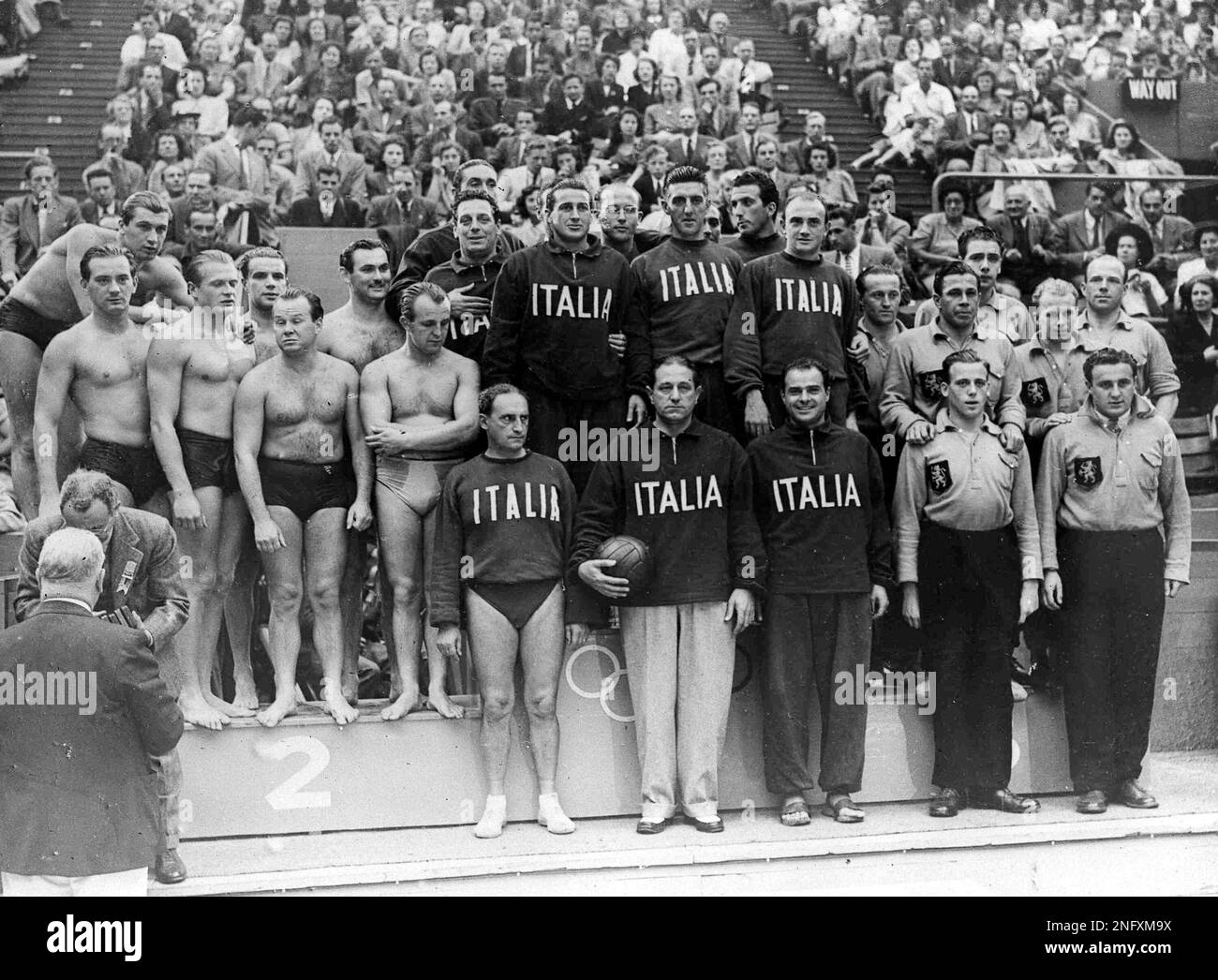The finalists of the men's Olympic Games Water Polo competition stand ...
