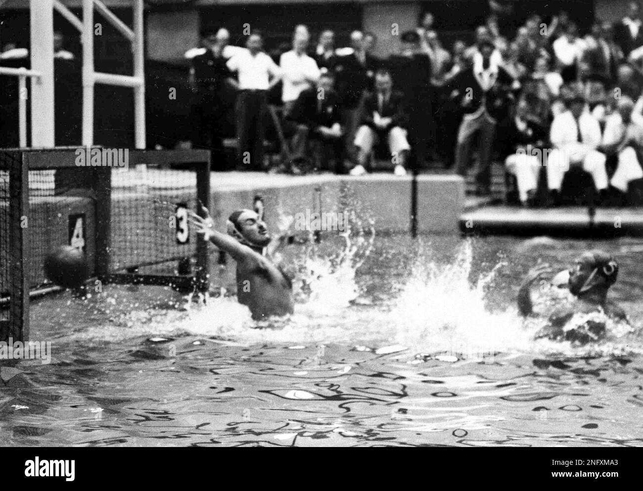 Iltaly's Gianfranco Pandolfini, no. 5, right, shoots past Hungary's