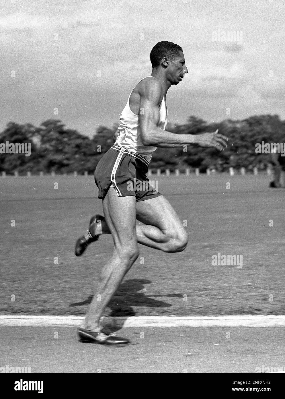 Jamaican athlete Herb McKenley trains for the 400metre sprint, on a