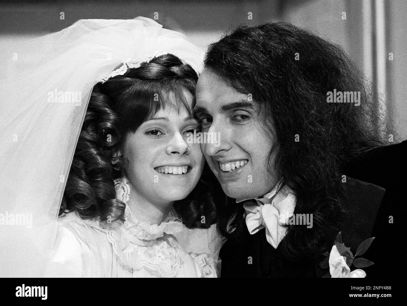 Falsettovoiced singer Tiny Tim poses Dec. 17, 1969 with his bride