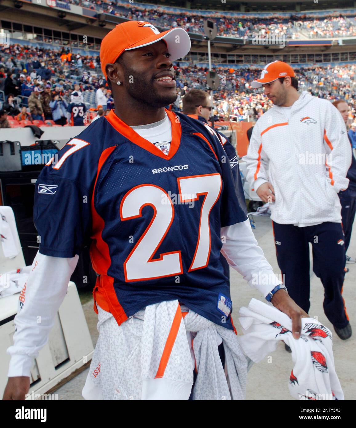 Denver Broncos injured cornerback Nick Ferguson wears the jersey of fallen  teammate Darrent Williams before the Broncos face the Minnesota Vikings in  the teams' NFL final regular-season football game in Denver on