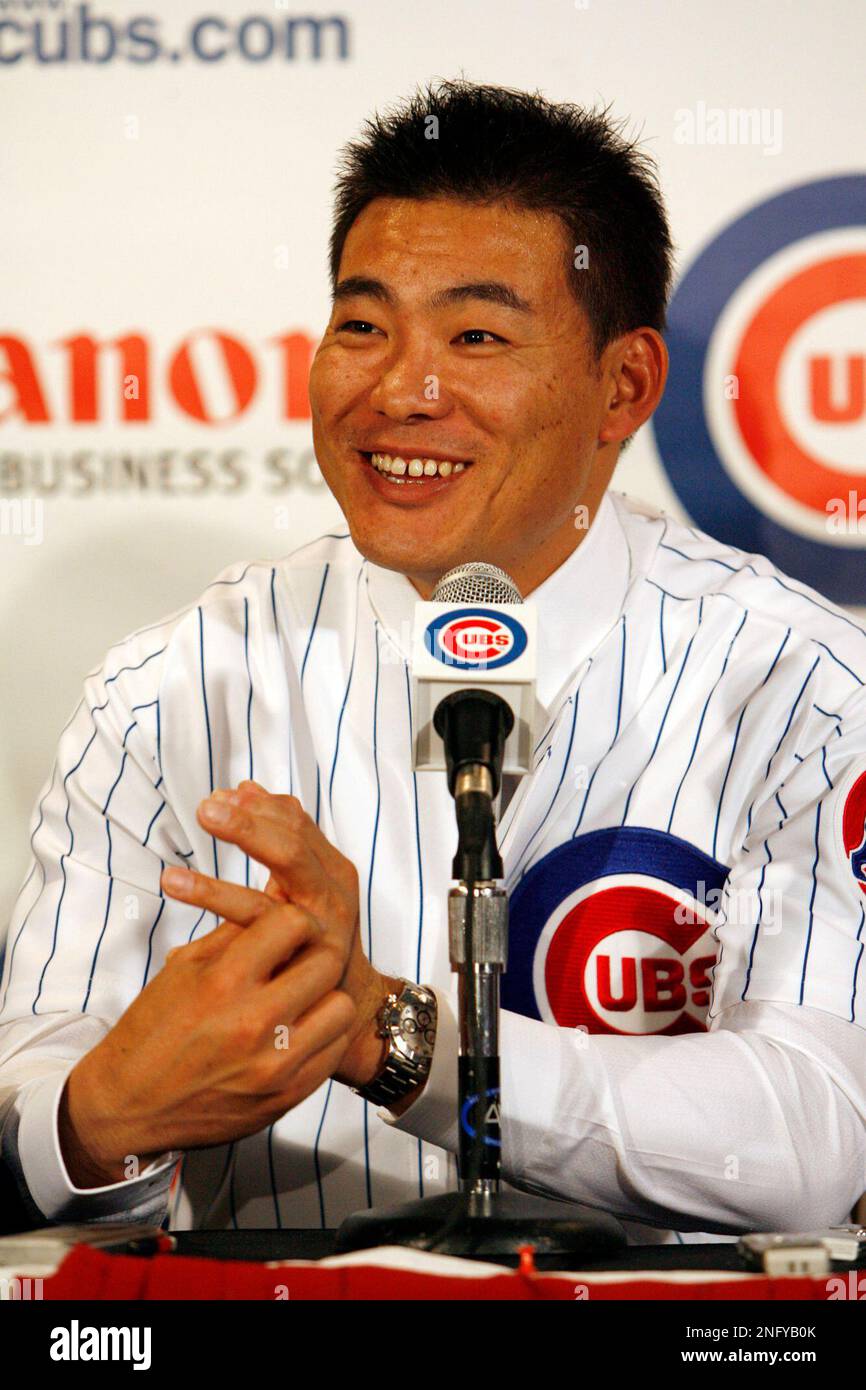 Chicago Cubs new outfielder Kosuke Fukudome, left, and Chicago Cubs general  manager Jim Hendry smile during a news conference at Wrigley Field,  Wednesday, Dec. 19, 2007, in Chicago. Fukudome signed a four-year