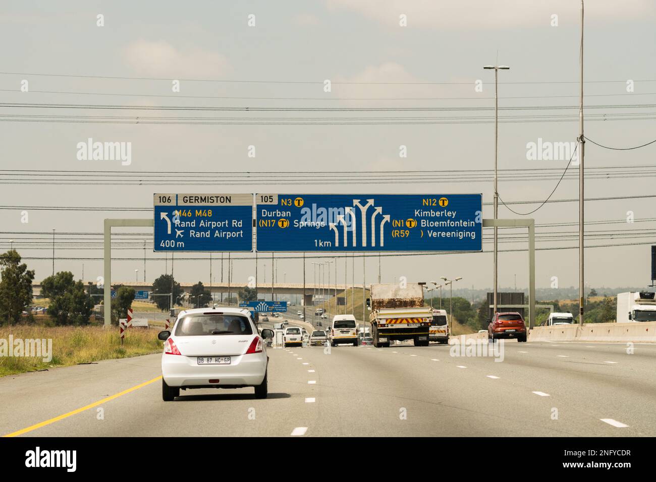 dual carriageway highway or national road in Gauteng, South Africa with cars and vehicles travelling on a busy toll road Stock Photo