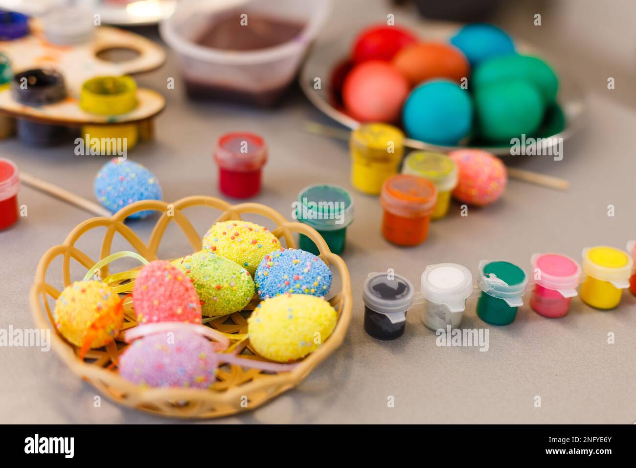 colouring eggs for eastertime at home Stock Photo