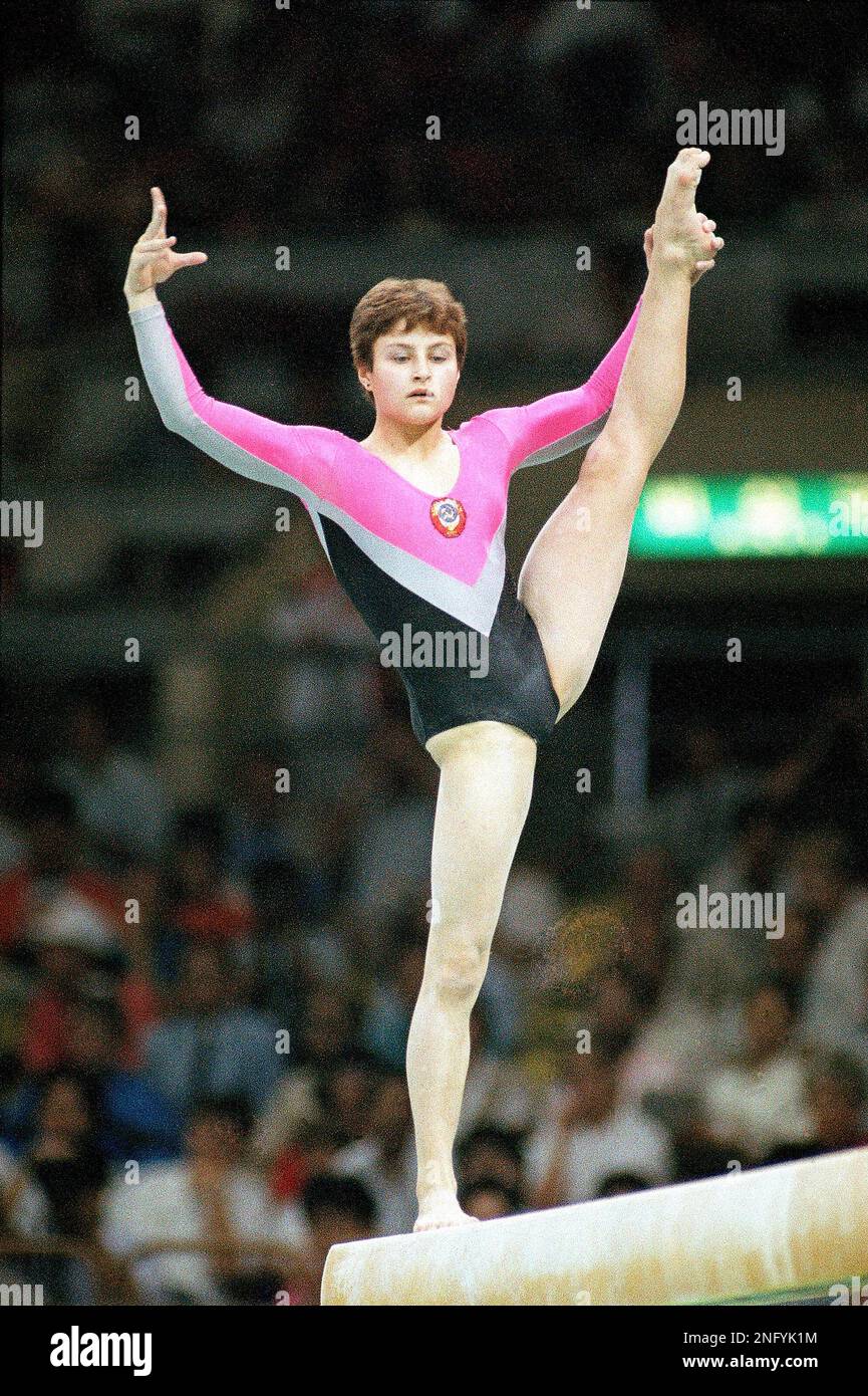 Soviet Elena Shushunova performs on the balance beam on her way to the ...