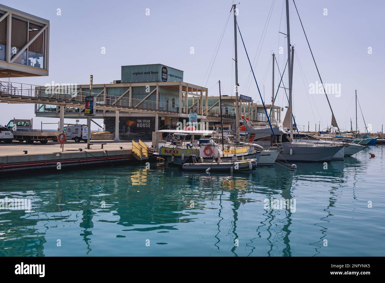 Restaurants in Old Port area next to blue flag marina in Limassol city in Cyprus island country Stock Photo