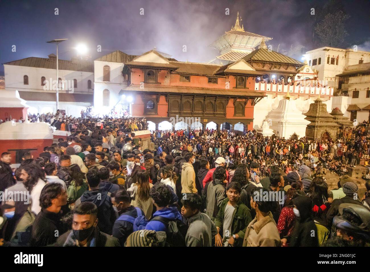 Kathmandu, Nepal. 17th Feb, 2023. Hindu devotees gather to observe the religious rituals and dance on the eve of the Maha Shivaratri festival at the premises of Pashupatinath Temple. Hindu Devotees from Nepal and India come to this temple to take part in the Shivaratri festival which is one of the biggest Hindu festivals dedicated to Lord Shiva and celebrated by devotees all over the world. Credit: SOPA Images Limited/Alamy Live News Stock Photo