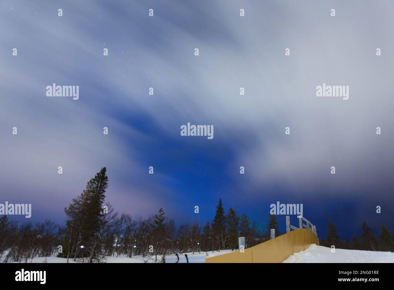 Clouds moving at night in Lapland. Long exposure Stock Photo