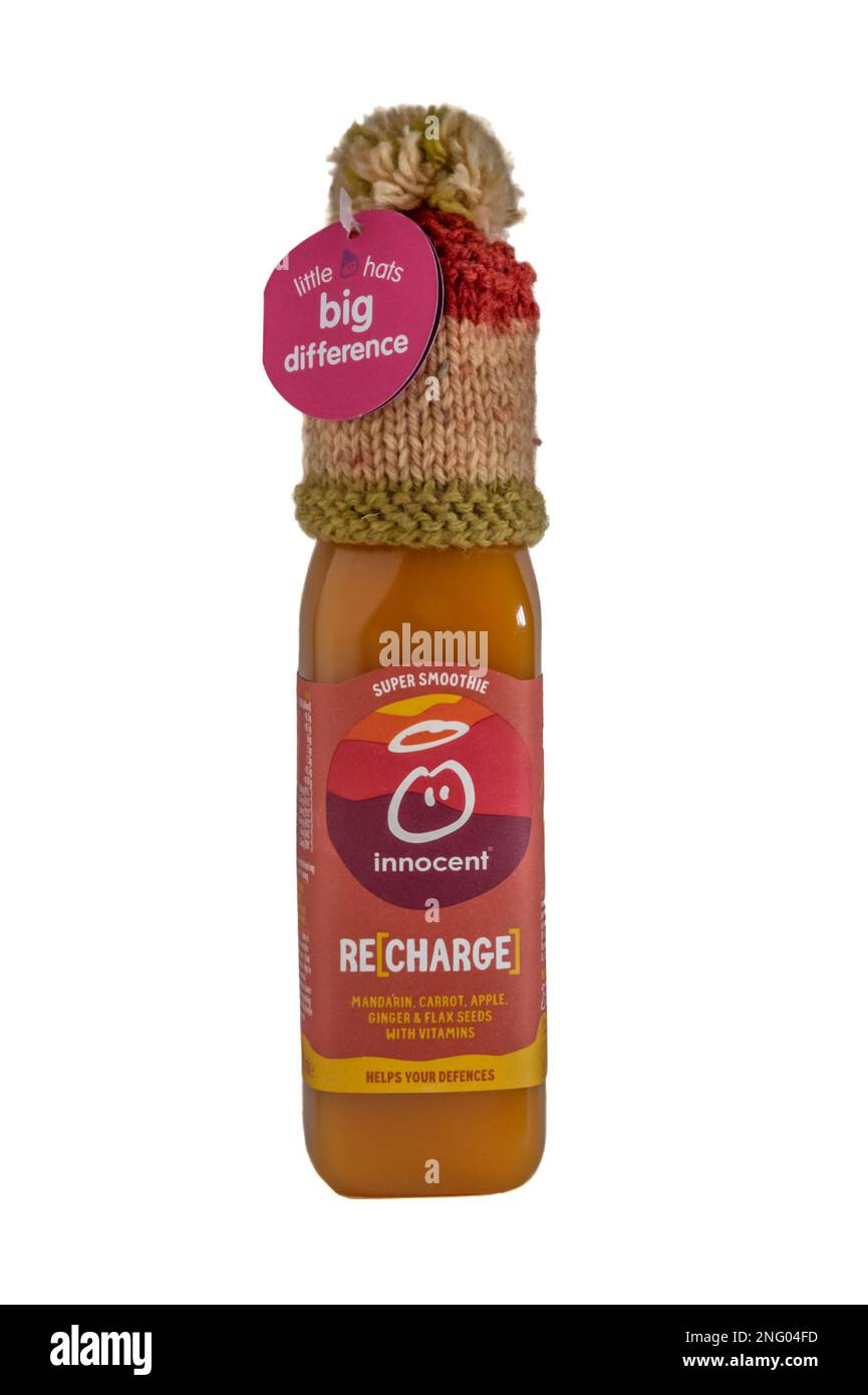 An Innocent Re[charge] Super Smoothie drink with a small woollen hat. Stock Photo