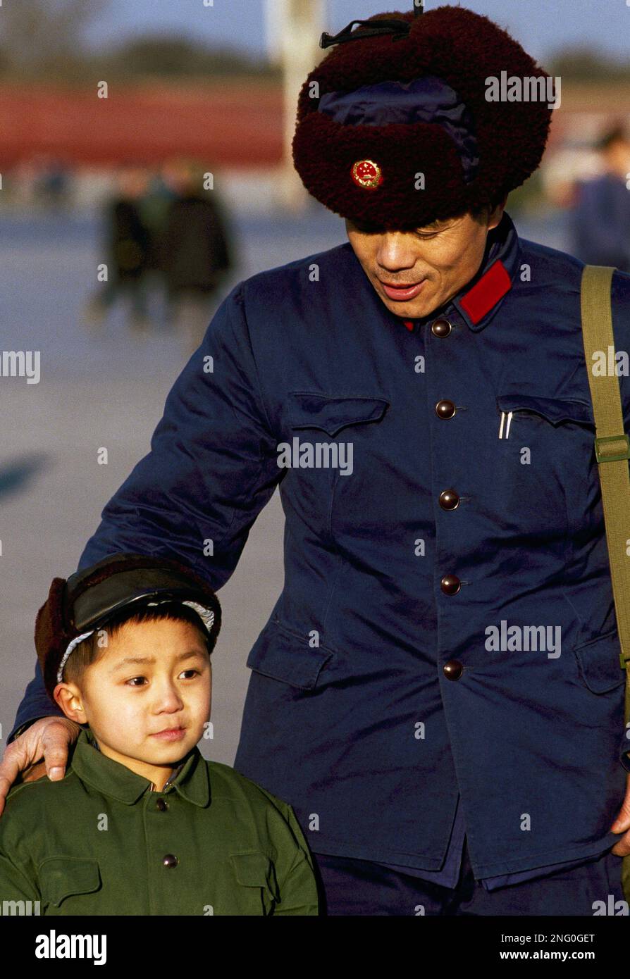 Pictured here is an unidentified Red Guard and young boy at the