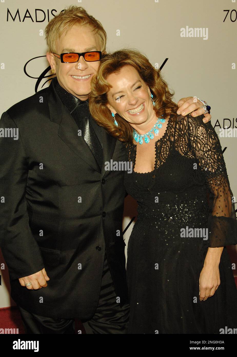 Singer Elton John and Caroline Gruosi Scheufele co president of