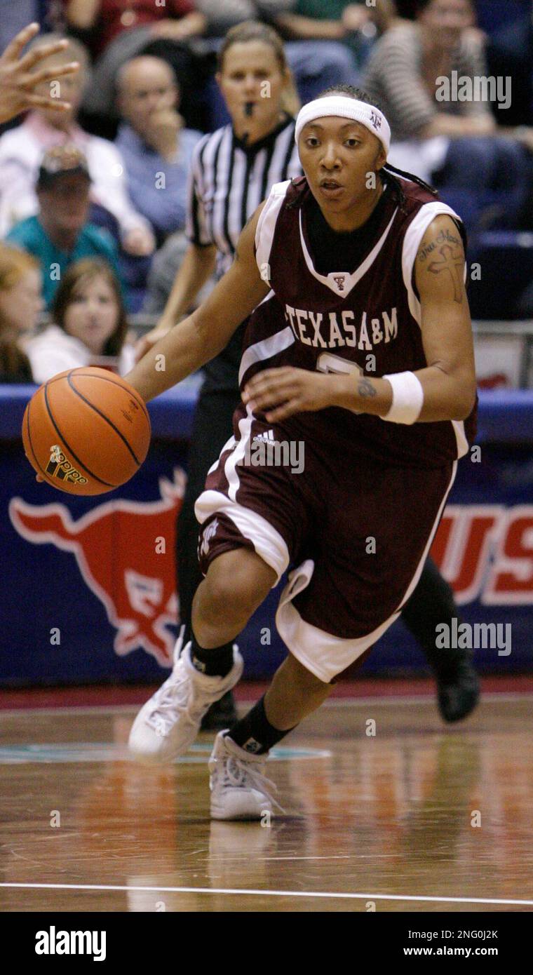Texas A&M guard Takia Starks dribbles during a basketball game against ...